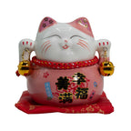 Hucha de cerámica en forma de gato de la suerte - rosa sobre cojín