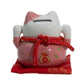 Hucha de cerámica en forma de gato de la suerte - rosa sobre cojín